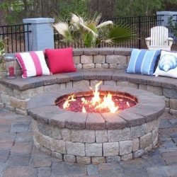 Firepit and seating ledge man made stone Firepit and seating ledge man made stone